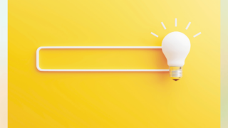 検索ボックスの上に電球が置かれたイラスト